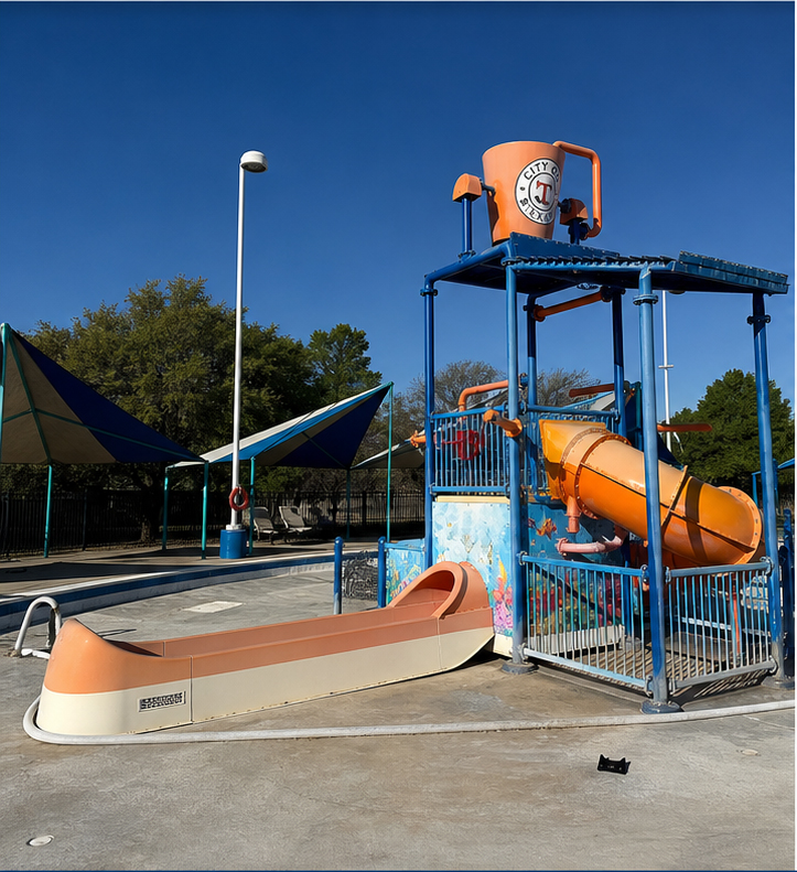 Before restoration close-up showing oxidation and fading on fiberglass water slide surface
