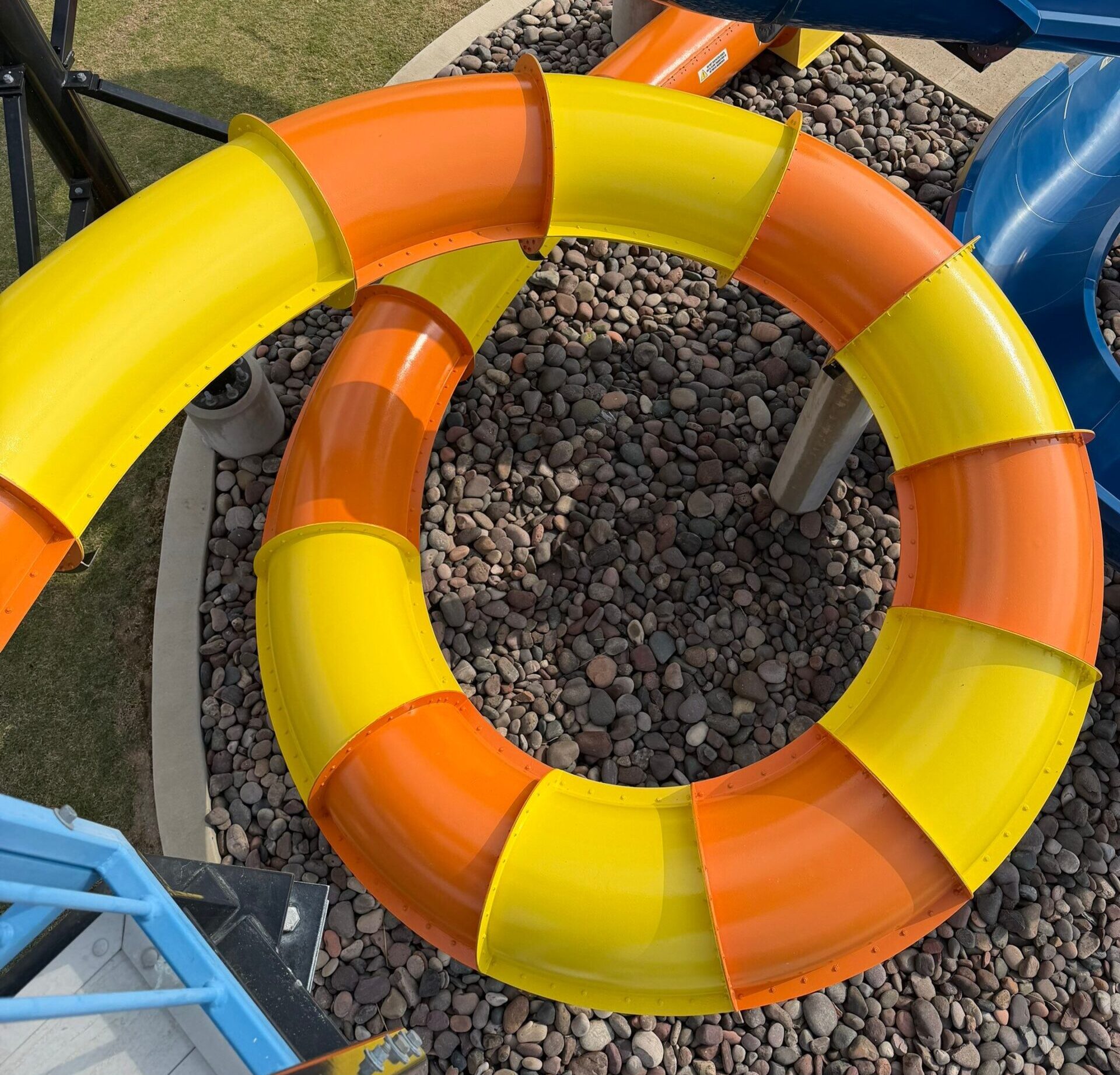 After restoration photo showing refreshed exterior water slide coating in Hurst Texas