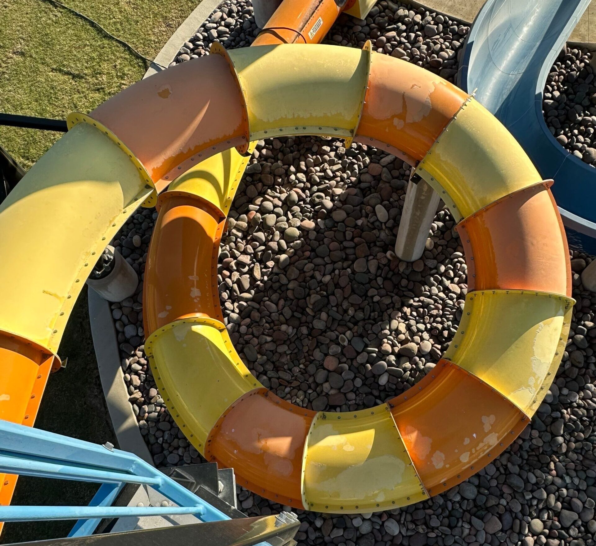 Before restoration photo showing faded exterior water slide coating in Hurst Texas