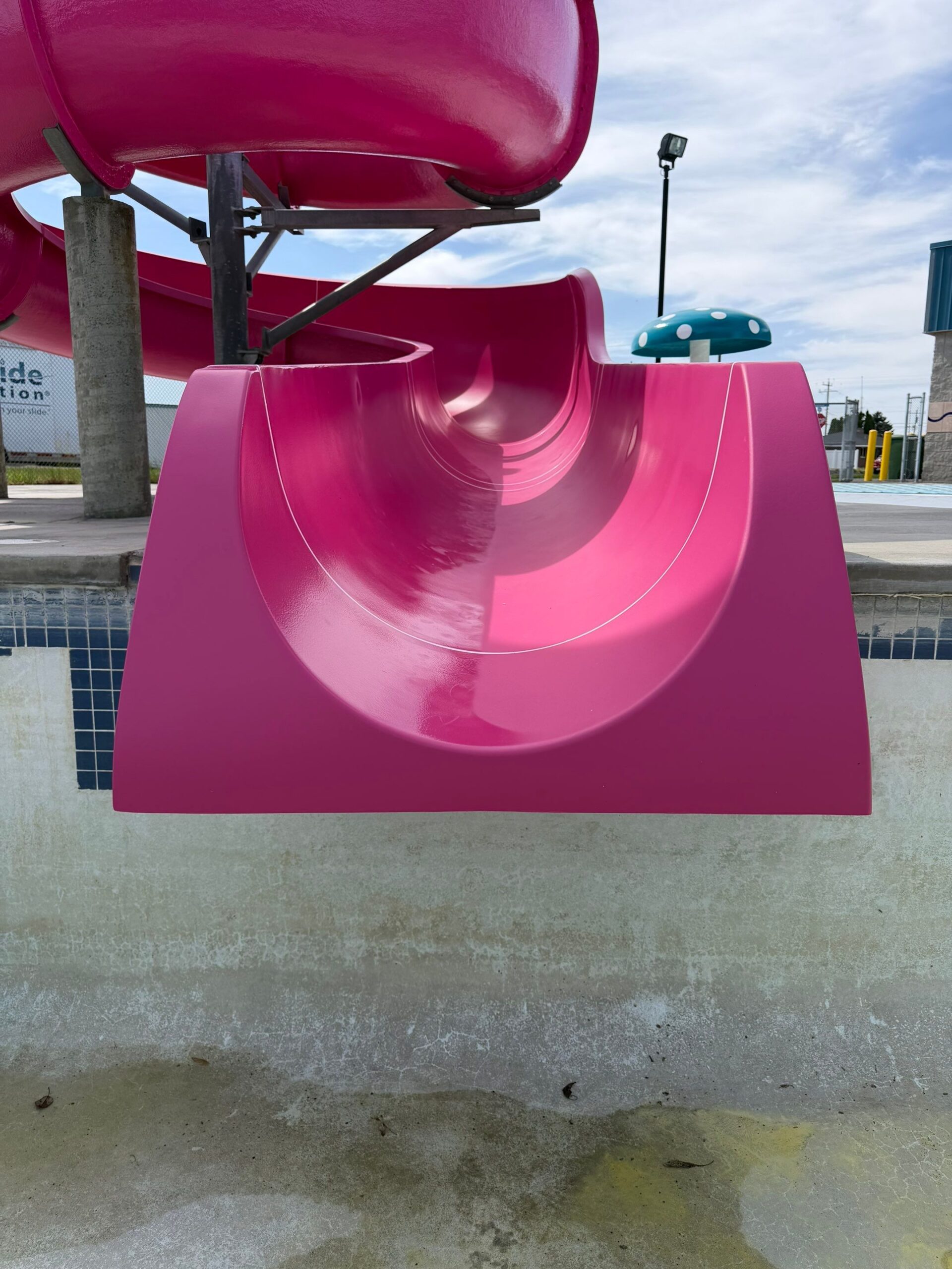 After restoration exit section of vibrant pink waterslide at Ritzville Waterpark