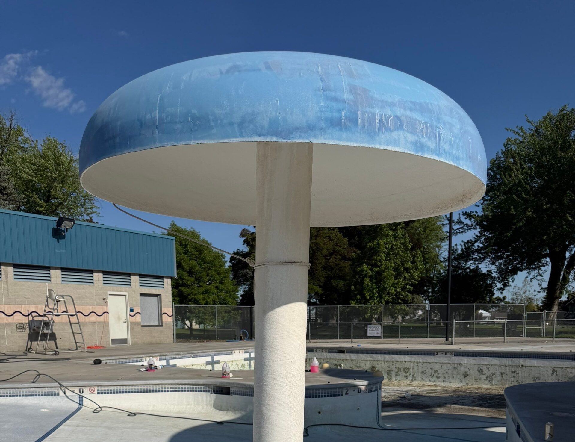 Before restoration mushroom play feature with faded finish at Ritzville Waterpark