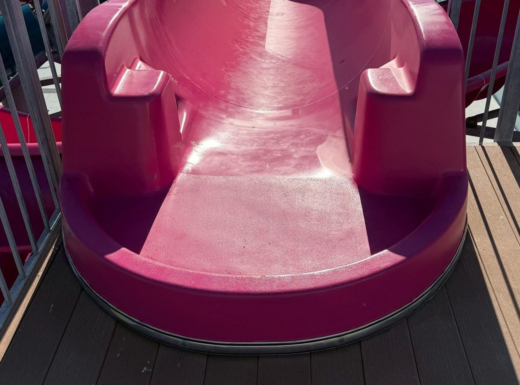 Restored magenta open flume start tub at Pella Aquatic Center